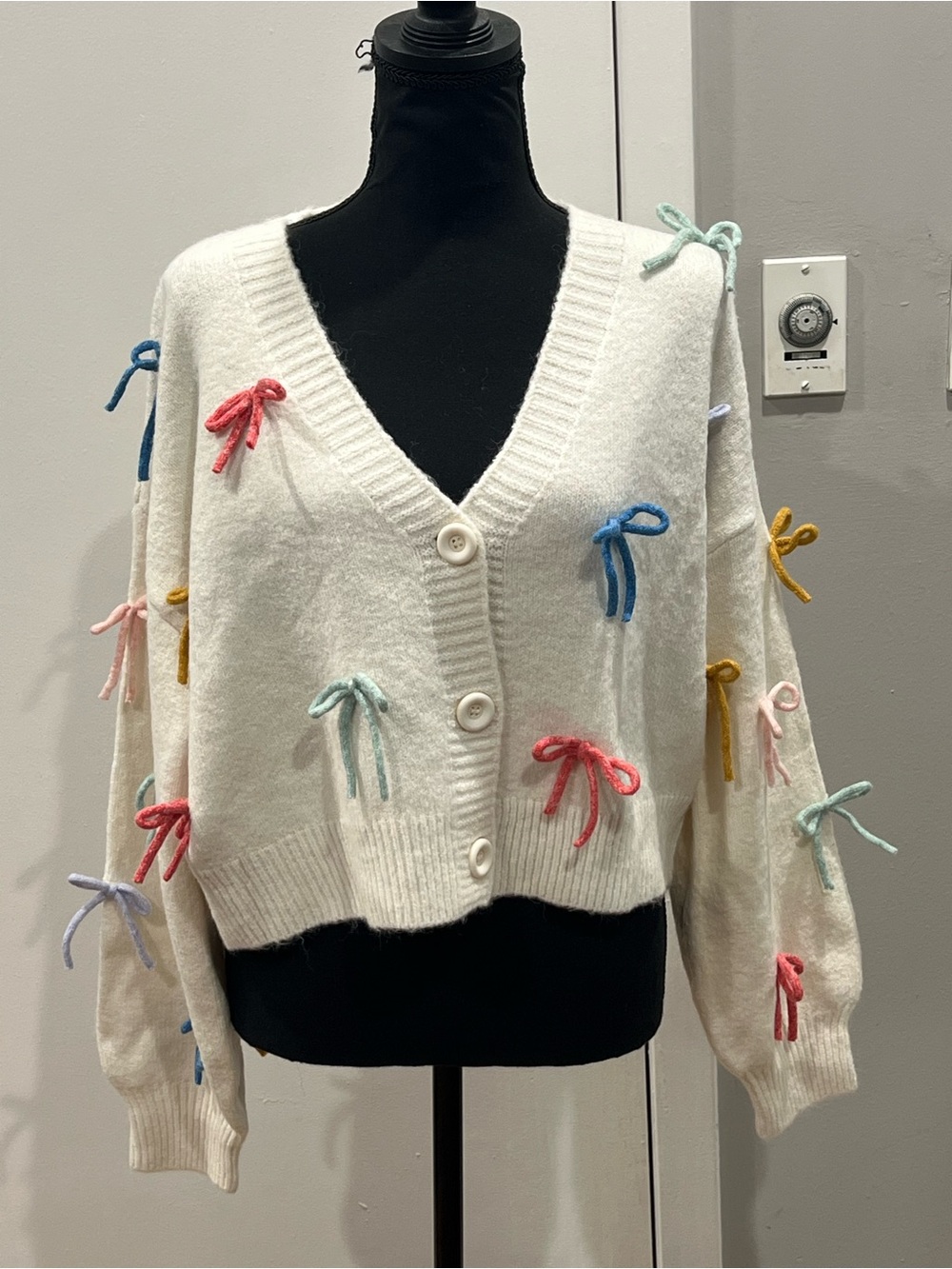White bow cardigan